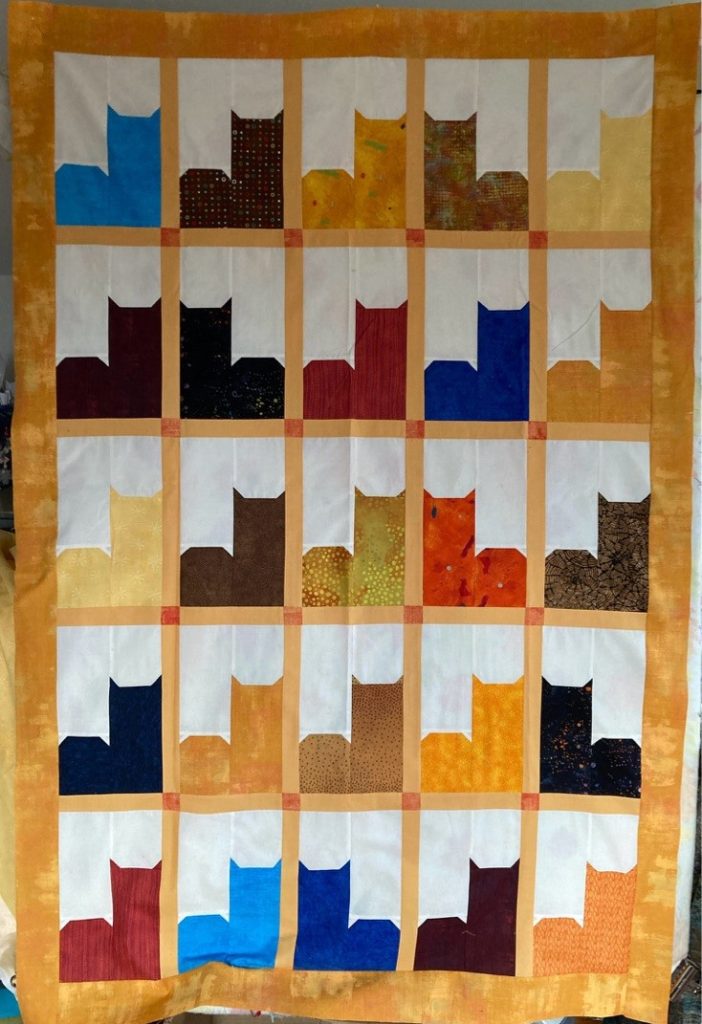 Sharon's Cats on a Shelf